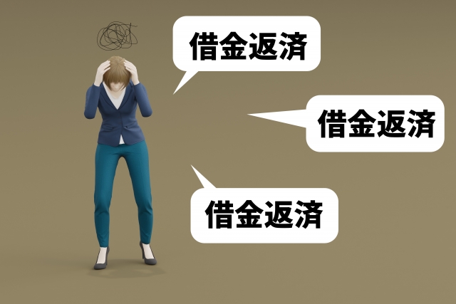お金を手に頭を抱える。高山市で弁護士や司法書士に債務整理の無料相談をする